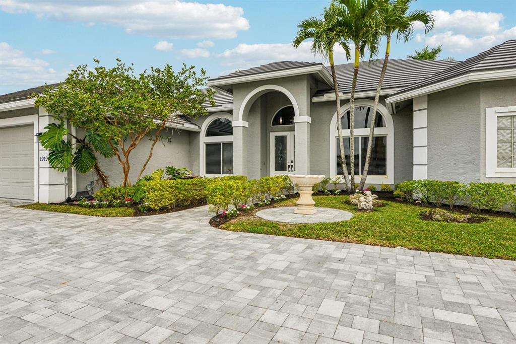 Photo of 1919 S CLUB Drive, Wellington, FL 33414 (MLS # B26070880)