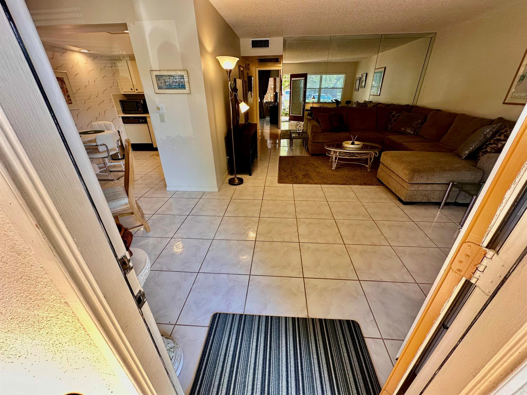 Comfortably FURNISHED 2/2 GROUND FLOOR ANNUAL RENTAL! PEACEFUL Patio Waterviews. COME HOME TO SERENITY EVERYDAY! Available annual starting 12-1-25. Schedule your own personal Showing Today!