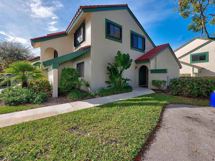Great location in PGA National, beautiful water view from inside and screened patio area. Completely New Kitchen remodeled 2018 with Stainless Steel Appliances, granite countertop etc., tiled floors in main areas, New Travertine Marble Patio Pavers. AC replaced 2018. First floor unit, one car garage, lots of guest parking, one Car Garage has New Electric Car Charger installed, inside Laundry Rm, high ceilings in Liv Rm, large windows and glass doors.