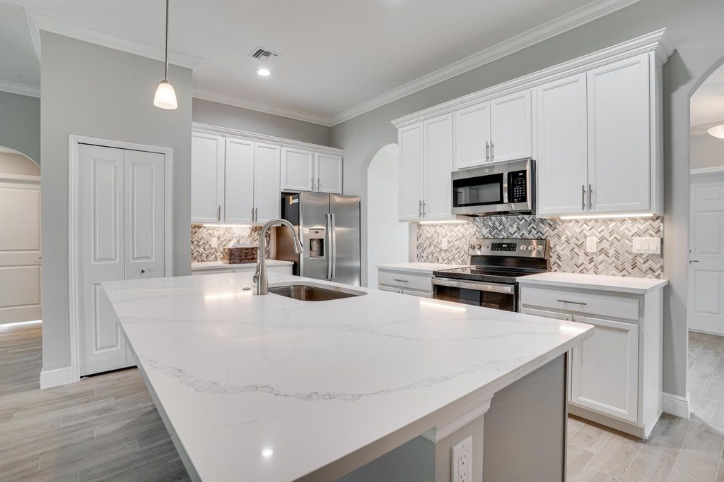 Photo of 5809 NW Beckham Court, Port Saint Lucie, FL 34986 (MLS # R11101073)