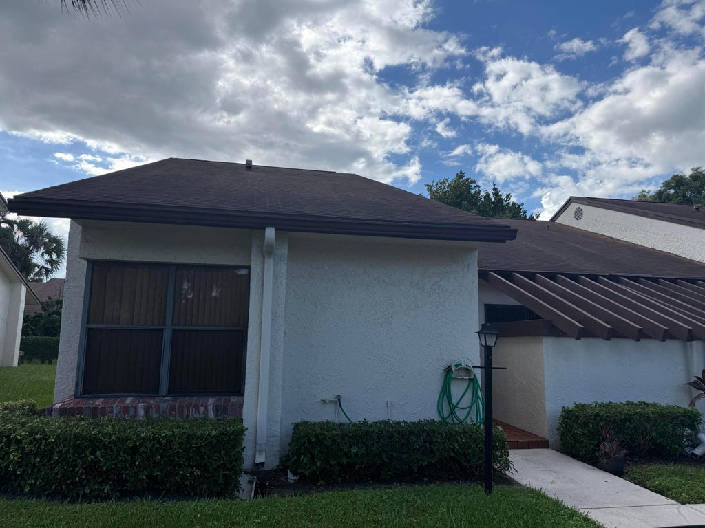 Photo of 3923 SILVER MAPLE Drive #A, Lake Worth, FL 33467 (MLS # B26086940)