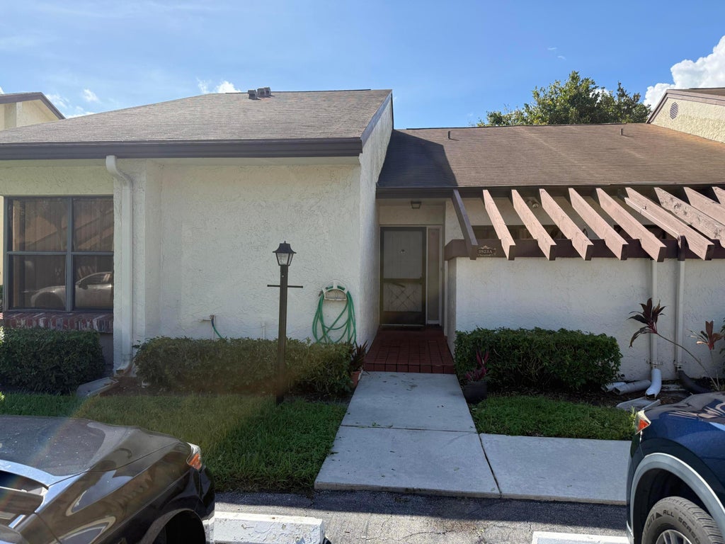 Photo of 3923 SILVER MAPLE Drive #A, Lake Worth, FL 33467 (MLS # B26086940)