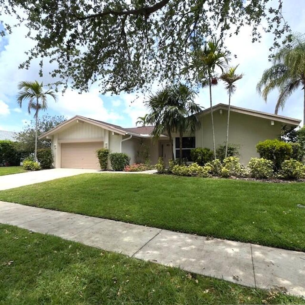 Photo of 2585 NW 31st Street, Boca Raton, FL 33434 (MLS # B26017517)
