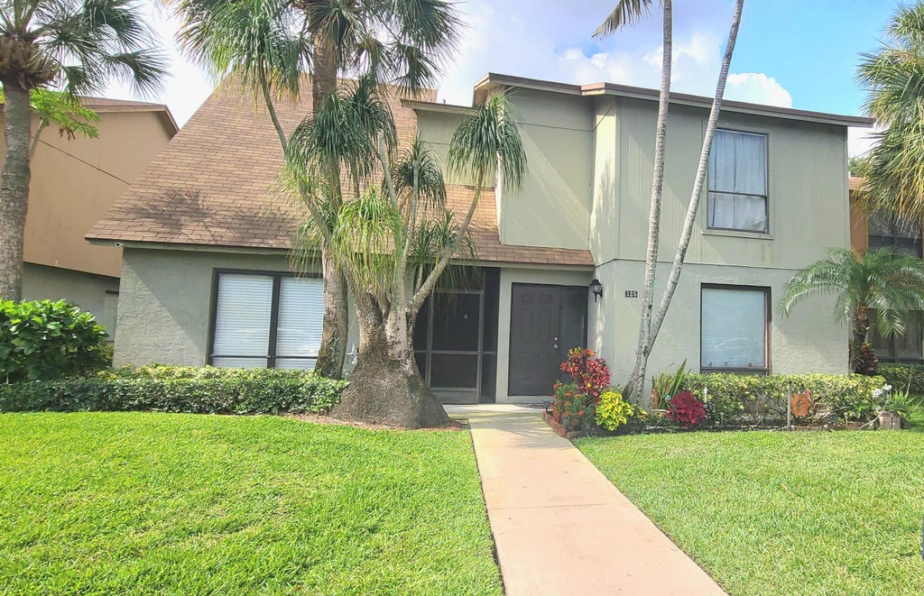 Photo of 325 Sandtree Drive, Palm Beach Gardens, FL 33403 (MLS # R10930498)