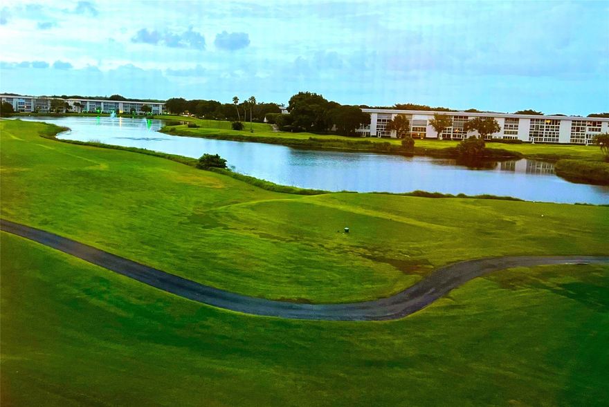 TURN-KEY FURNISHED PENTHOUSE with SPECTACULAR GOLF/WATER/FOUNTAIN VIEW from the HURRICANE GLASS ENCLOSED PATIO Plus TOTAL REMODEL Including SLATE STYLE TILE FLOORS and SMOOTH CEILINGS THRU-OUT and an OPEN DESIGN KITCHEN with STAINLESS STEEL APPLIANCES, Wood Cabinetry and GRANITE Counter/Backsplash Plus a SHOWER IN BOTH BATHROOMS and BUILT-IN CLOSETS. Conveniently Located NEXT TO CLUBHOUSE. ASSOCIATION REQUIRES ONE OCCUPANT 55+ PLUS $250 REFUNDABLE MOVE-IN FEE. ONE VEHICLE ONLY. Information Deemed Reliable but, Not Guaranteed. PARKING SPACE 126