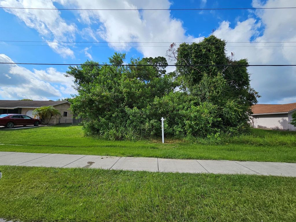 Photo of 2352 SE Melaleuca Boulevard, Port St Lucie, FL 34952 (MLS # R10895765)