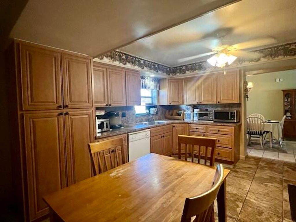 Photo of 1309 Wedgworth Road, Belle Glade, FL 33430 (MLS # R11025914)