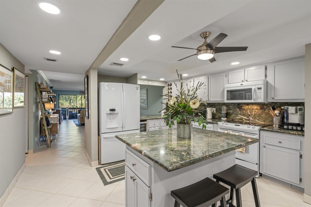 Paradise found on the Intracoastal Waterway! Stunning 2 bedroom 2 bathroom waterfront condo in the heart of North Palm Beach. Modern updates abound and the HUGE kitchen will satisfy the discerning pampered chef. You and your guests can watch the boat parades from your vantage point on the third floor plus the Intracoastal views extend to the Master Bedroom! The highly desired Marina Bay Condo features a large pool & clubhouse and is literally five minutes from a Jack Nicklaus Signature Golf Course, many restaurants including waterfront dining, a brewery and luxury shopping centers. This rare opportunity to enjoy the lifestyle of the Palm Beaches will not last so make an appointment before you miss out.