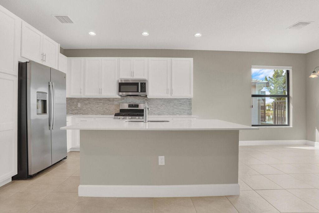 Photo of 11935 SW Backshore Drive, Port Saint Lucie, FL 34987 (MLS # R11168140)