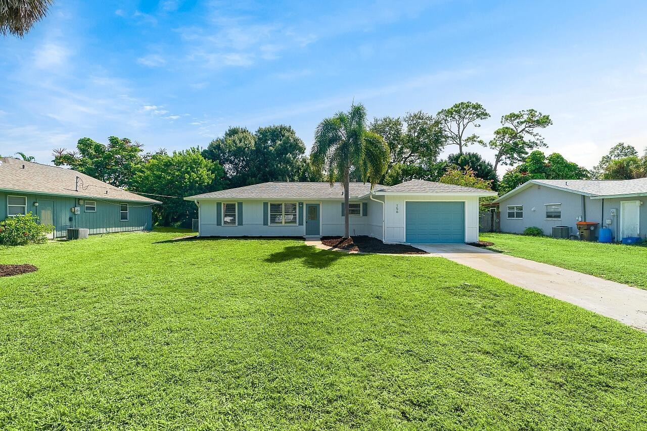 Welcome to this lovingly updated coastal home in the heart of Vero Beach. Features include new flooring +baseboards throughout, a split floorplan, updated bathrooms & kitchen, fresh interior/exterior paint, new lighting fixtures/ceiling fans/hardware/blinds & more! The kitchen is completed with shaker cabinetry, subway tile backsplash, SS appliances and granite counters. The primary bedroom has an en-suite bathroom plus walk in closet. Enjoy lounging on your lanai overlooking the fenced back yard. Roof: 2018 , AC:2017, Water Heater: 2020, shutters & immaculate garage, too! NO FHA until 10/17