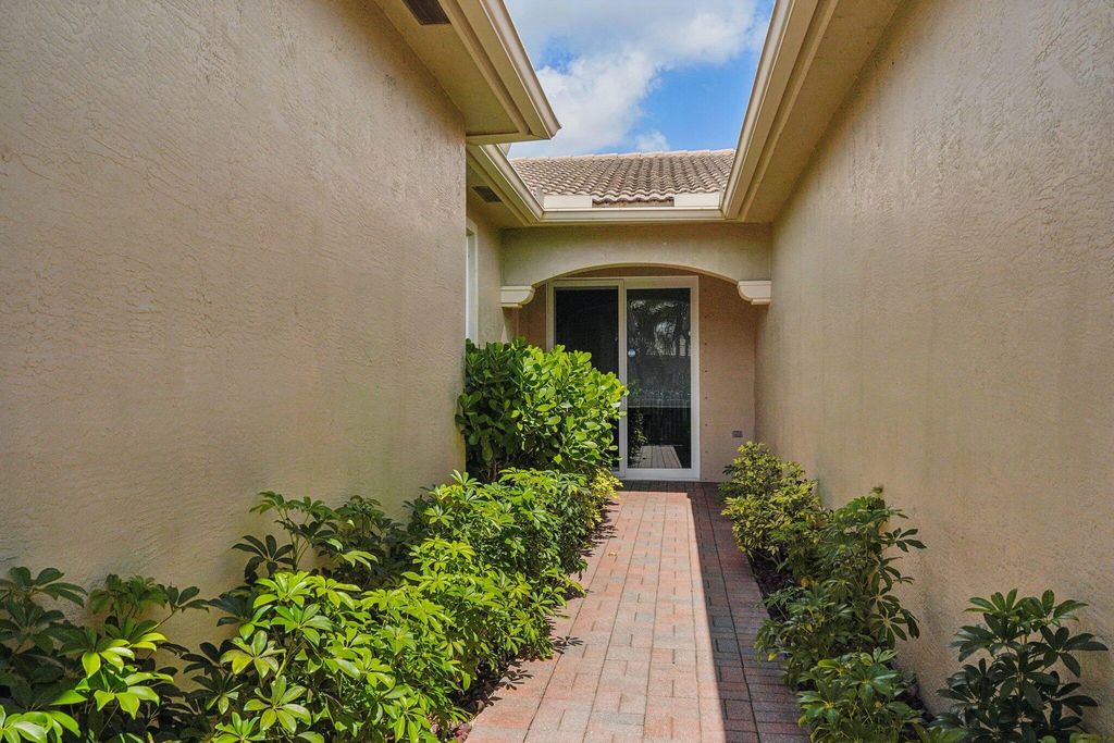 Photo of 8601 Mangrove, West Palm Beach, FL 33411 (MLS # B26008311)