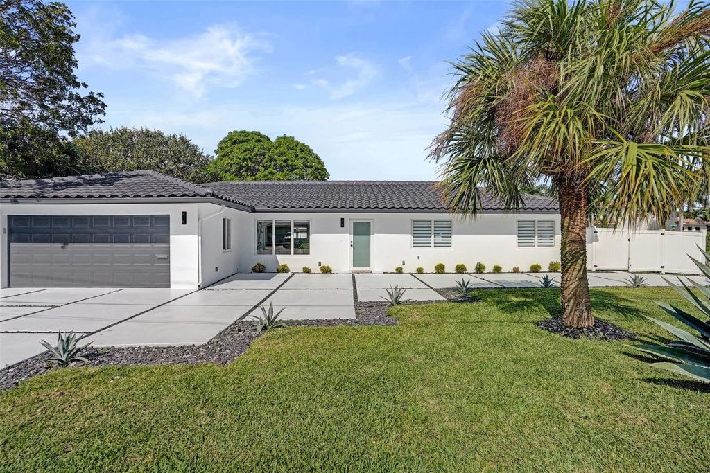 Photo of 699 NE 70th Street, Boca Raton, FL 33487 (MLS # F10536106)