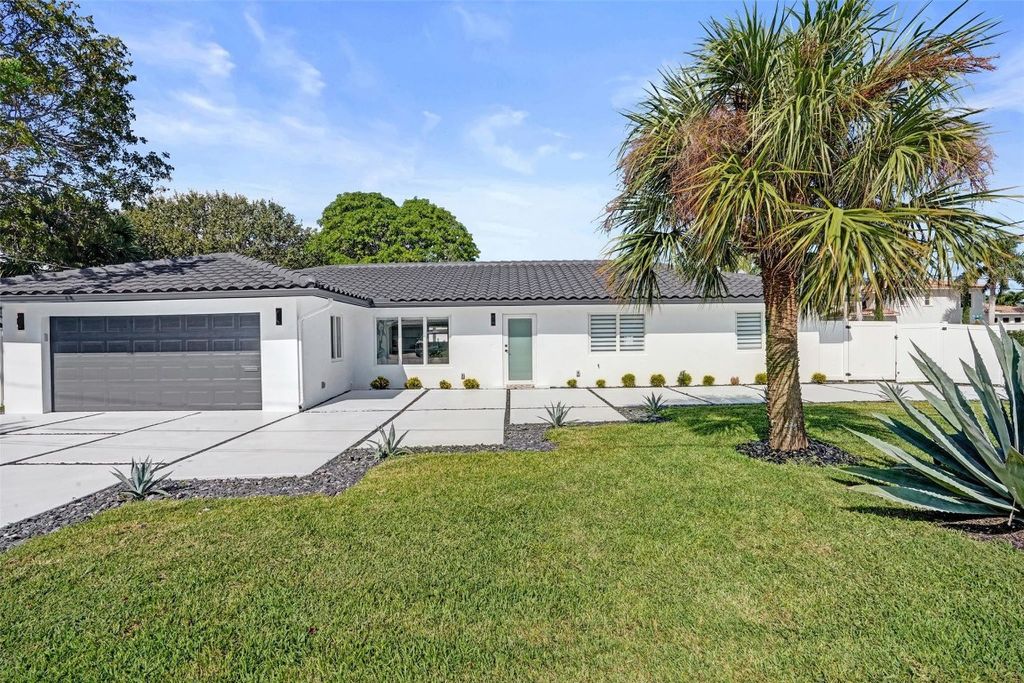 Photo of 699 NE 70th Street, Boca Raton, FL 33487 (MLS # F10536106)