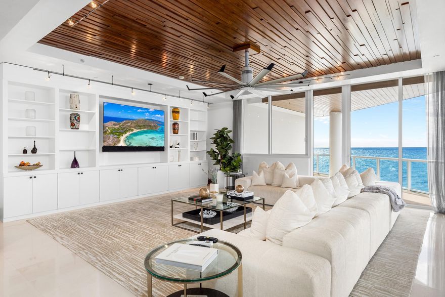 Perched within the prestigious One Thousand Ocean in Boca Raton, Residence 501 is an extraordinary oceanfront unit that embodies the epitome of modern architecture. 

Meticulously crafted, this residence offers an oasis of tranquility with four elegantly designed bedrooms and 4.1 baths. The expansive living space of 4,908 square feet presents an environment of serene luxury, meticulously designed to provide both comfort and sophistication. Upon entering the private foyer, natural light floods the interiors through expansive floor-to-ceiling glass windows, illuminating the contemporary-chic space. The residence showcases a seamless blend of form and function, marrying the breathtaking ocean, city, and intercoastal views with meticulous design finesse. Enhanced by two expansive wrap-around terraces, each providing a canvas for awe-inspiring views, this residence invites a harmonious connection with the surroundings. 

One Thousand Ocean goes beyond conventional luxury living, offering hotel-like concierge services such as manned gated security, onsite management, and valet parking. This full-service building elevates the living experience to unmatched levels of opulence and convenience. Every residence at One Thousand Ocean is thoughtfully designed, featuring Ocean and/or Lake Terraces that bathe the spaces in natural light and provide the most breathtaking views.

Indulge in oceanfront living at its finest, where sophistication and exclusivity converge to create an extraordinary living experience at One Thousand Ocean.