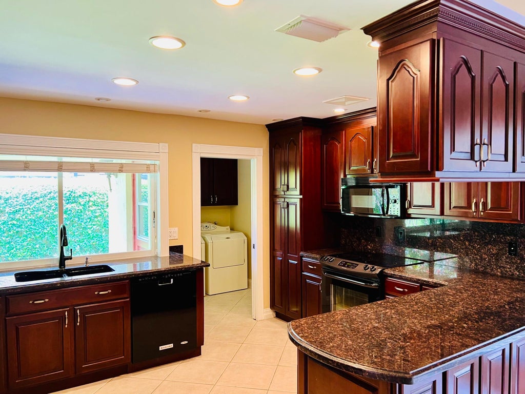 Photo of 11356 Twelve Oaks Way, North Palm Beach, FL 33408 (MLS # R10987672)