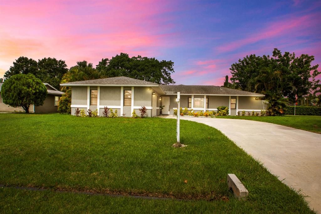 Photo of 2316 SW Lejune Street St, Port St Lucie, FL 34953 (MLS # R10737871)