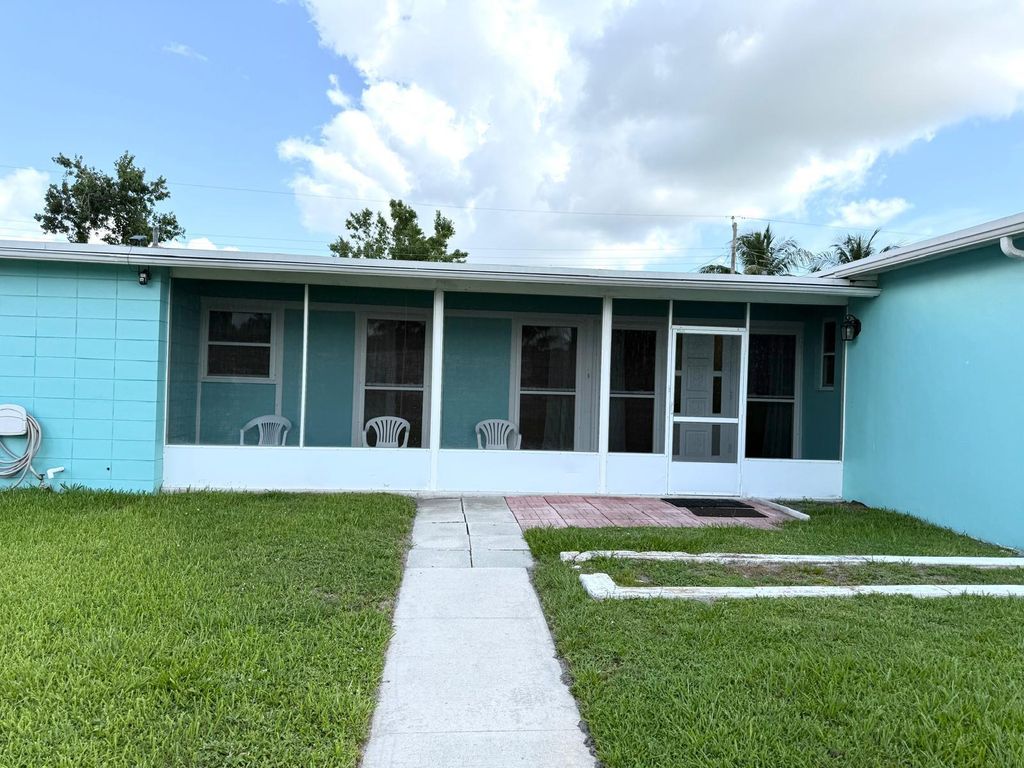 Photo of 121 S Naranja Avenue, Port St Lucie, FL 34983 (MLS # R11099893)