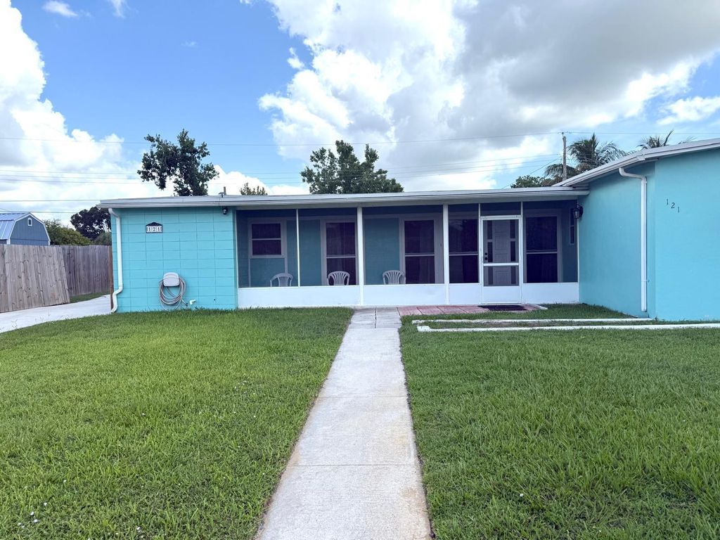 Photo of 121 S Naranja Avenue, Port St Lucie, FL 34983 (MLS # R11099893)