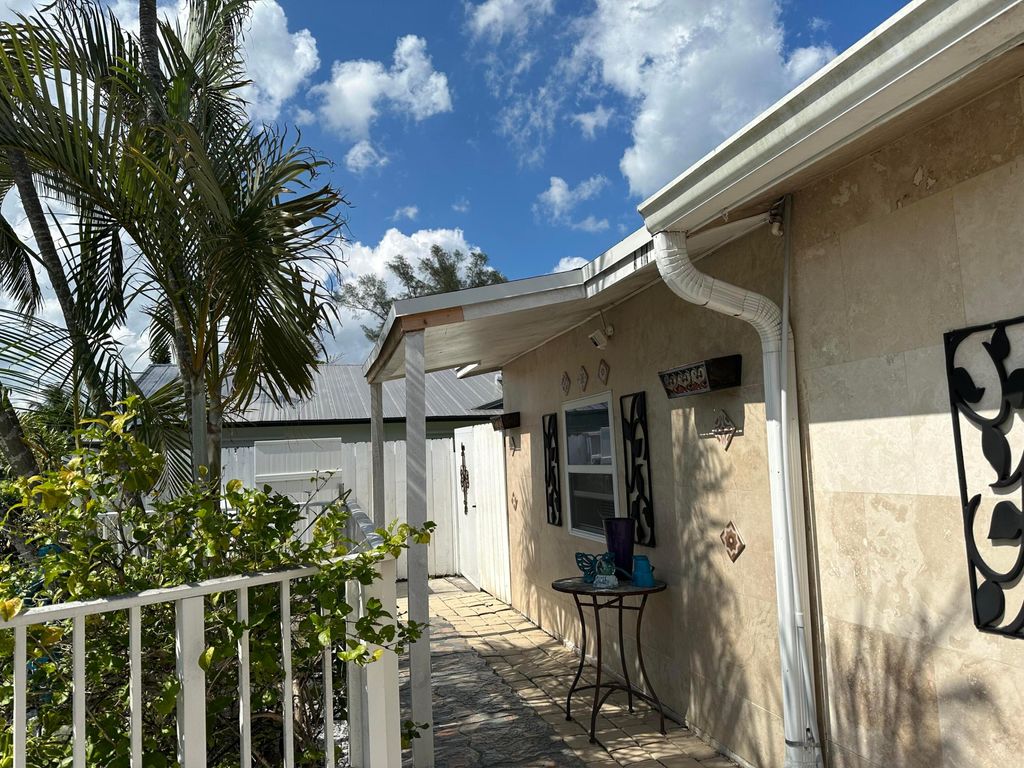 Photo of 8070 E Rose Marie Ave Avenue E, Boynton Beach, FL 33472 (MLS # B26028964)