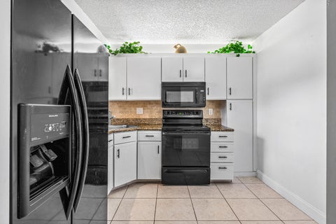 Tiny photo for 8609 Boca Glades Boulevard W #A, Boca Raton, FL 33434 (MLS # B26031408)