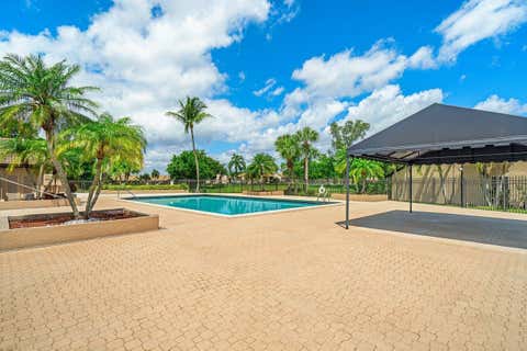 Tiny photo for 8609 Boca Glades Boulevard W #A, Boca Raton, FL 33434 (MLS # B26031408)