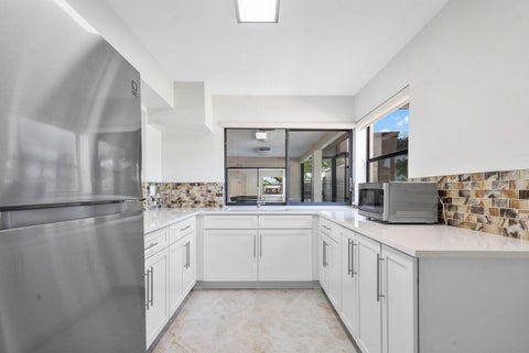 Tiny photo for 8609 Boca Glades Boulevard W #A, Boca Raton, FL 33434 (MLS # B26031408)