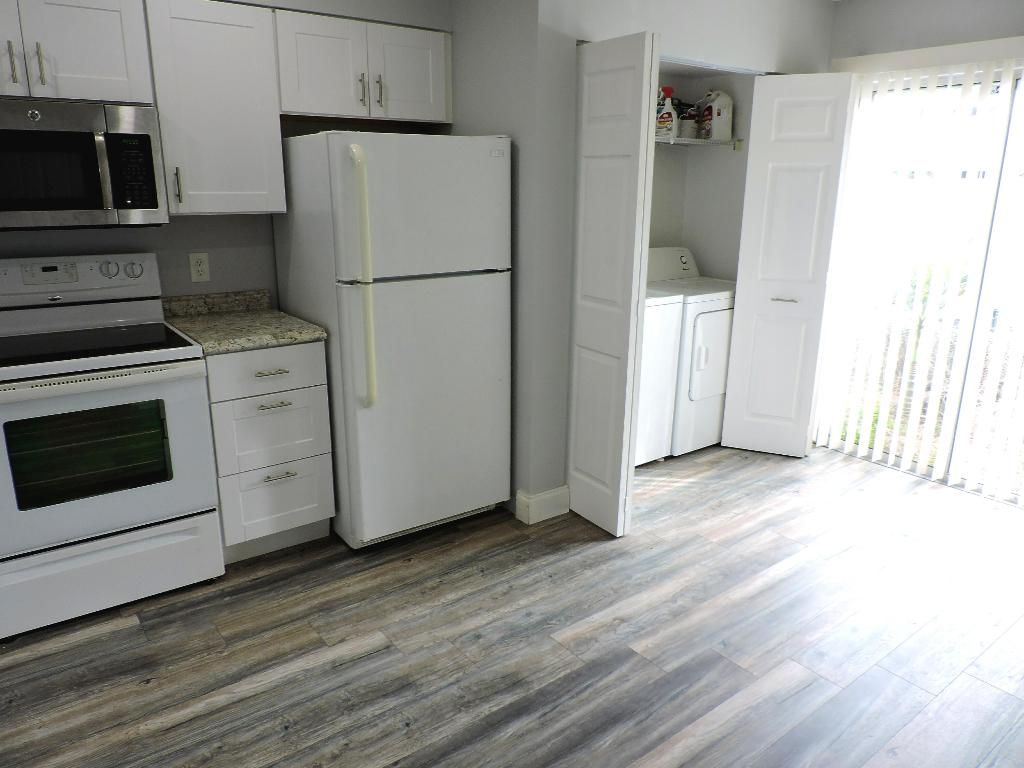 Photo of 6198 Riverwalk Lane #7, Jupiter, FL 33458 (MLS # R10960653)