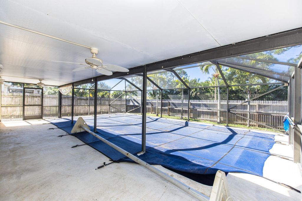 Photo of 107 Rosewood Circle, Jupiter, FL 33458 (MLS # R10773619)