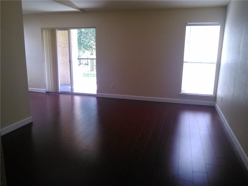 This is the unit you have been looking for! Beautiful 2/2, vaulted ceilings, updated kitchen, open balcony with lovely garden view, large windows allow lots of natural light, gorgeous wood laminate throughout living area, each bedroom has a walk-in closet, each bath a linen closet...lots of storage for all of your stuff! Desirable community across from the Coral Square Mall, close to movies, dining, shopping, parks, good schools...all of your needs! Don't miss this one! 2 car spaces. Credit over 650 req.