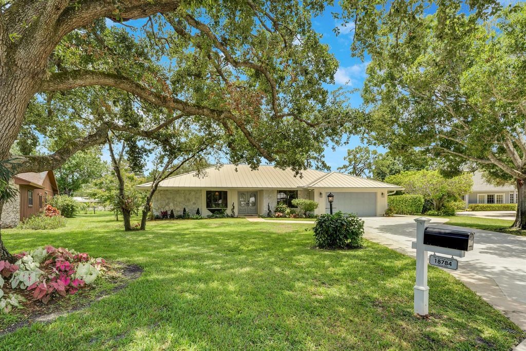 Photo of 18784 Falcon Way, Jupiter, FL 33458 (MLS # R11103856)