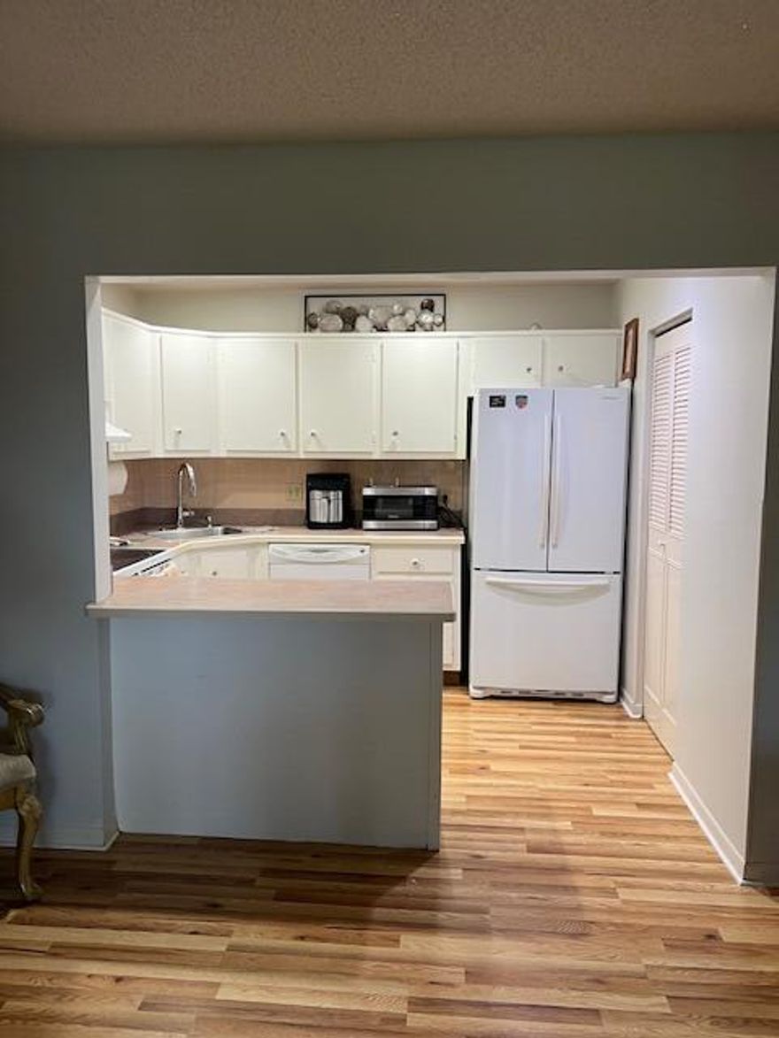 Welcome home to this charming, fully remodeled and Fully Furnished 2-bedroom, 1-bath condo in the desirable 55+ community of Pine Ridge. Step inside and enjoy beautiful laminate flooring throughout the main living areas and tile in the bathroom--no carpet to worry about!The spacious master bedroom features a generous walk-in closet, and for added peace of mind, the condo includes partial impact windows along with accordion shutters. You'll love the convenience of having your own in-unit washer and dryer, plus a nice-sized pantry for extra storage.Relax on your lovely front patio overlooking the garden--perfect for morning coffee or unwinding in the evening. There's also an additional storage closet right on the patio for even more space.