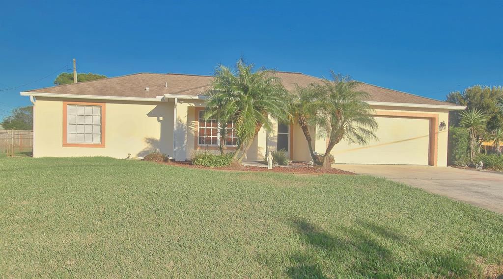 Photo of 1791 SE Flintlock Road, Port Saint Lucie, FL 34952 (MLS # R10706993)