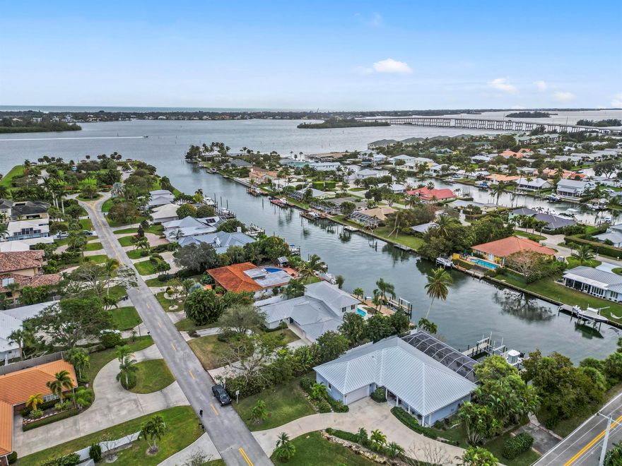 Welcome to 25 Park Avenue, a stunning waterfront home located on a deep water canal just an eighth of a mile from wide open intercoastal access. This beautifully renovated property offers open-concept living with all-new high-end finishes throughout. The spacious second-floor entertainment area includes a bar and breathtaking views of the water. Every detail has been carefully designed, including the complete renovation of the kitchen and all four bathrooms. Step outside to a private, expansive outdoor living space featuring a pool, spa, and an extra-large dock with two slips, davits, a lift, and an additional floating dock. Perfect for both relaxation and entertaining, this home offers ideal spaces for enjoying morning coffee or hosting sunset gatherings. Located in Vero Beach