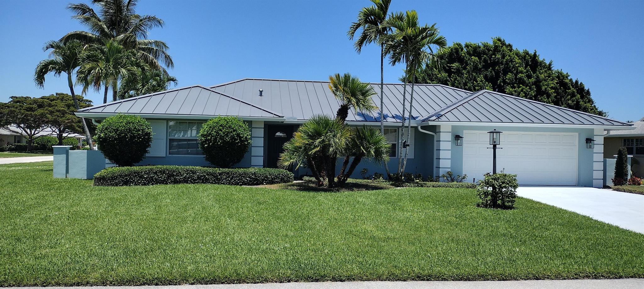 Wonderfully updated spacious home in Little Club. Brand new roof. Oversized kitchen with granite countertops and tons of storage. Beautiful wood flooring in main living areas. Many windows bringing in lots of light. Each bedroom has a walk-in closet. Fully furnished. Great location with 9-hole golf course available as well as community pool and clubhouse, pickleball, tennis, bocci ball, shuffleboard, library and social activiities. A must see today!