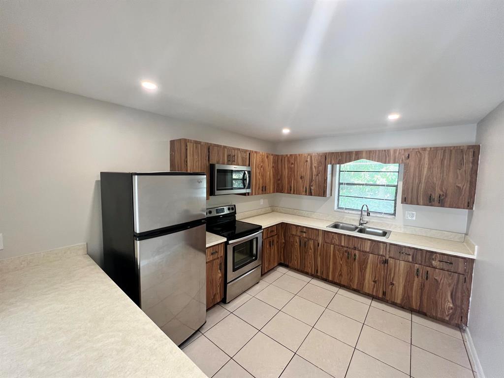 TROPIC EAST CONDO - Residential Lease