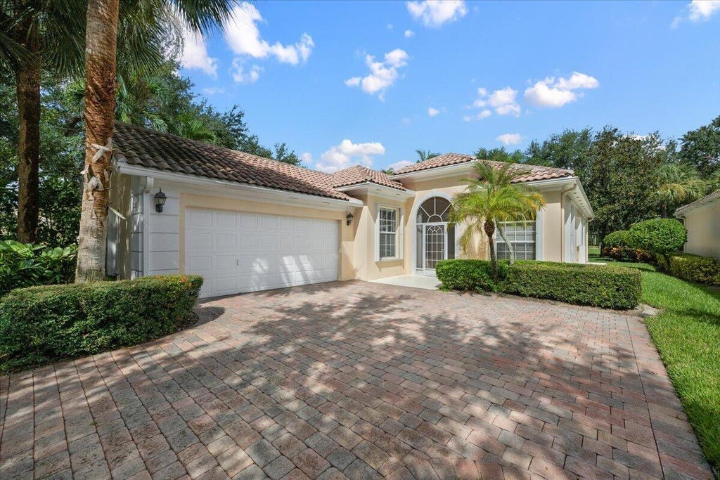 Photo of 306 Aegean Road, Palm Beach Gardens, FL 33410 (MLS # B26074710)