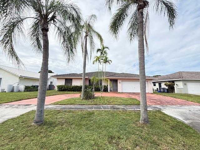 Charming Home in the desirable Terrace Tranquila Community of Boca Raton. Near Town Center Mal, Top- Rate Schools, dining, vibrant shopping and Beaches. Garage for 2 cars and generous driveway provide capacity up to 4 vehicles . The property offers a serene pf endless potential for outdoor living enhancements .