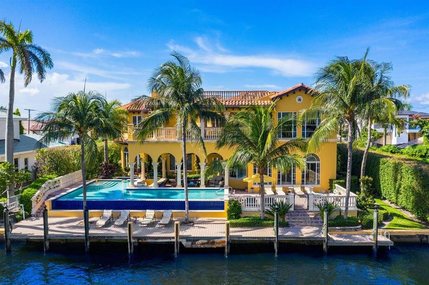 Elegance and tradition are the hallmarks of this luxurious waterfront estate. Boasting 103 feet of waterfrontage with Intracoastal views, the quality built residence offers a classic design with 6,238 total square feet; four bedrooms, formal dining and living rooms; open eat-in kitchen with family room; and mid level game room. Enjoy outdoor living and entertaining with several covered loggias, private balconies, rooftop viewing deck, enormous infinity pool with spa, summer kitchen, extended private dock, and nearby inlets for easy ocean access. This custom-built Mediterranean home has been professionally designed to compliment the complete luxury waterfront lifestyle. Enjoy the tranquil setting, beautiful water vistas, sunsets and the incredible opportunity that awaits. More...