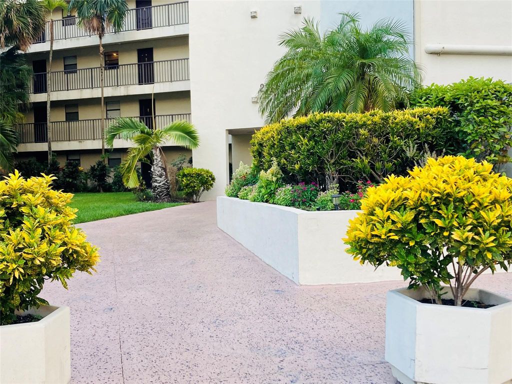 Photo of 2316 S Cypress Bend Drive #317, Pompano Beach, FL 33069 (MLS # F10455595)