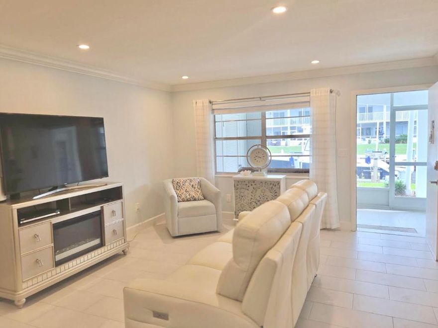 Waterfront! Renovated! No Stairs! This stunning 2 bedroom, 2 bathroom condo in highly-sought after North Palm Beach is available for annual or seasonal lease; beautifully furnished, or unfurnished. Enjoy sweeping blue-water views from your spacious screened patio. Boat slips available for rent through the association! This bright and airy unit features a sleek white kitchen and modern coastal bathrooms, tile floors throughout, and ample storage space. Enjoy a community heated saltwater pool and outdoor grills, a clubhouse, and fishing dock! The building has recently been painted. Active 55+ Community. Very convenient location - minutes to North Palm Beach Golf + Country Club, Fabulous Restaurants and Downtown areas, the beach, Palm Beach International Airport and more! This is FL Living!