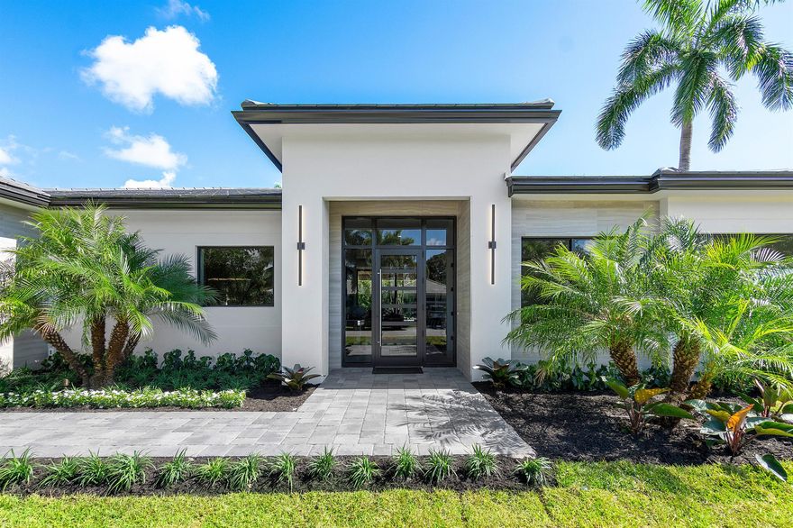 Brand new construction! This stunning single-level home is your dream escape in the heart of Delray Beach. Situated on a spacious corner lot in the sought-after Lake Ida neighborhood, it is just steps away from parks and a short stroll from the vibrant Atlantic Avenue. The beach is only minutes away.High ceilings create a light and airy feel throughout the home, with 6-panel pocketing 10' sliders bringing the outside Florida sunshine in. The expansive living area offers ample space for everyone to relax and connect. The home boasts four bedrooms, each with its own designer-appointed private bath. A dedicated private office can easily be used as a fifth bedroom, offering ultimate flexibility. The split floor plan ensures privacy for everyone.