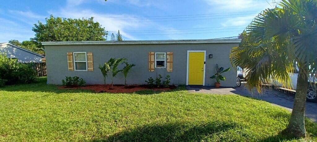 Photo of 9090 Arpege Place, Lake Worth, FL 33467 (MLS # R10861221)