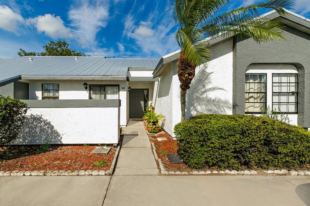 Photo of 562 SW Tamworth Street, Port Saint Lucie, FL 34953 (MLS # R10861931)