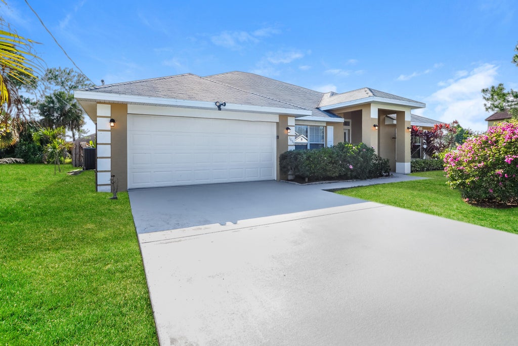 Photo of 3668 SW BALLWEG Street, Port Saint Lucie, FL 34953 (MLS # B26057768)