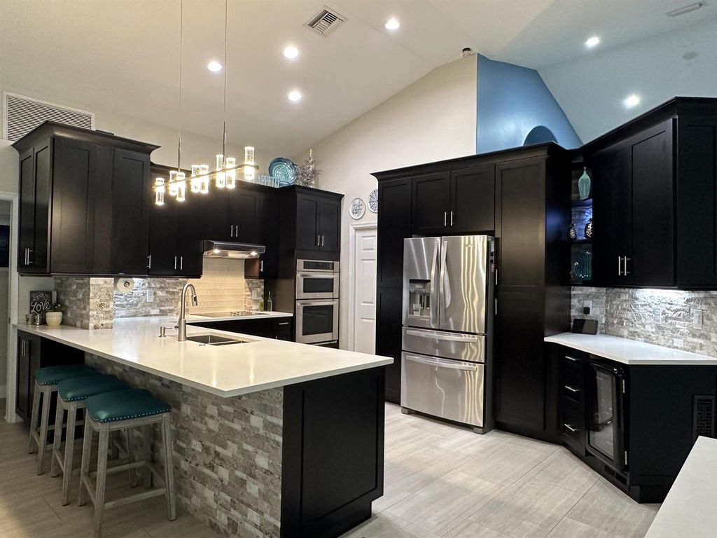 Photo of 275 Crane Point N, Jupiter, FL 33458 (MLS # R11027663)