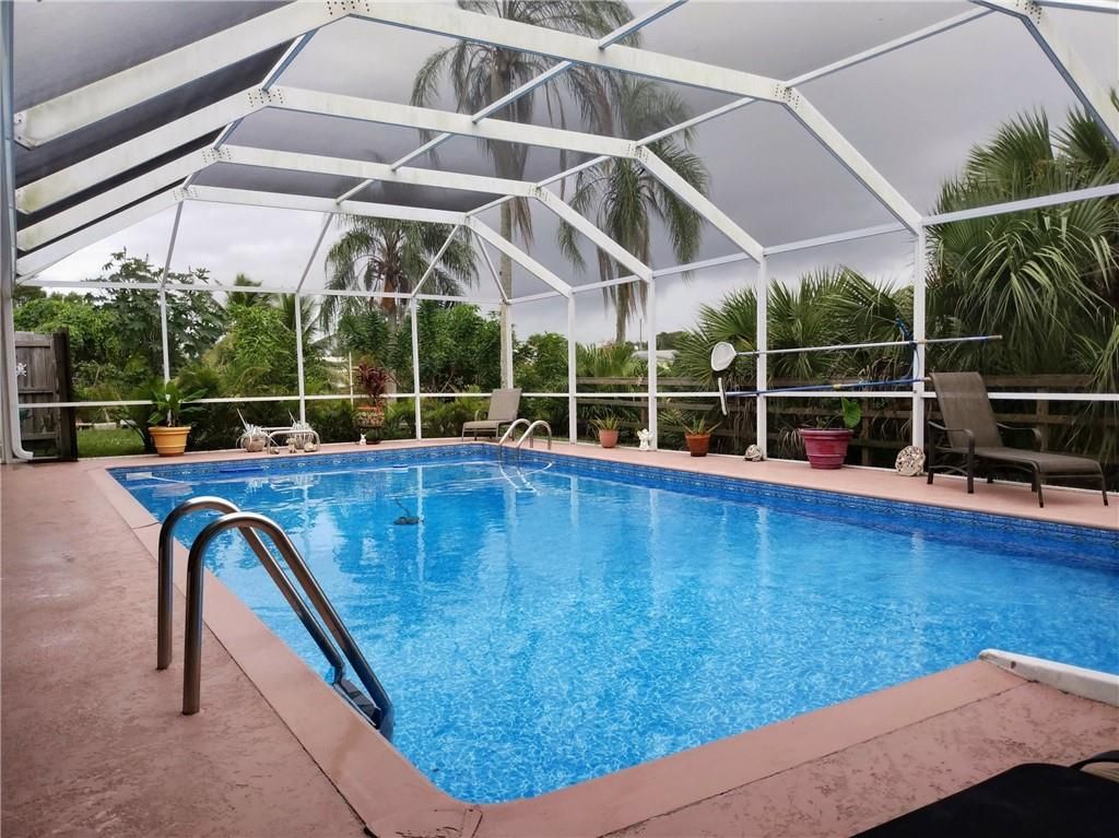 Photo of 795 SE Arton Ln, Port Saint Lucie, FL 34983 (MLS # F10312768)