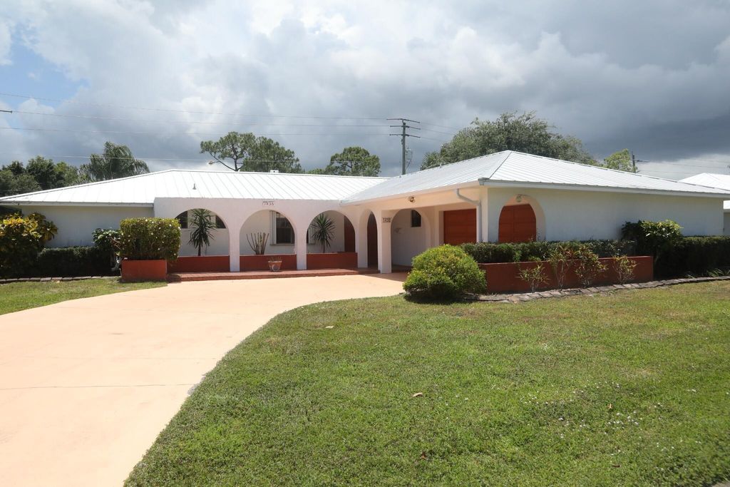 Photo of 1436 SE Sunshine Avenue, Port Saint Lucie, FL 34952 (MLS # R11089167)