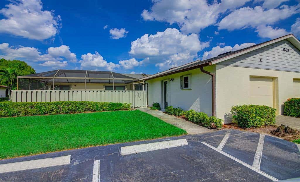 Photo of 1539 Pheasant Walk #C, Fort Pierce, FL 34950 (MLS # R10693685)