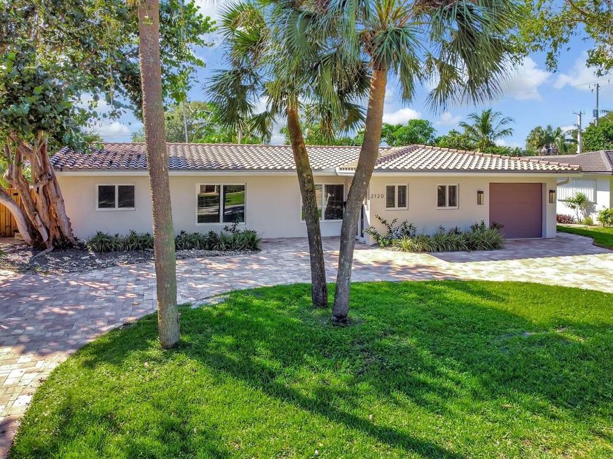 A rare opportunity to own a fully renovated home on one of Lighthouse Point’s most desirable streets! This beautiful 3-bed, 3-bath home offers 1,900 total sqft of modern design with timeless elegance. Renovated in 2022, it features bedrooms with en-suites, an open floor plan, a kitchen island, and spacious living areas. Step outside to your private oasis with a heated pool, BBQ, covered patio, and outdoor dining space—perfect for relaxing Florida evenings. Enjoy a 1-car garage, circular driveway, and lush landscaping.