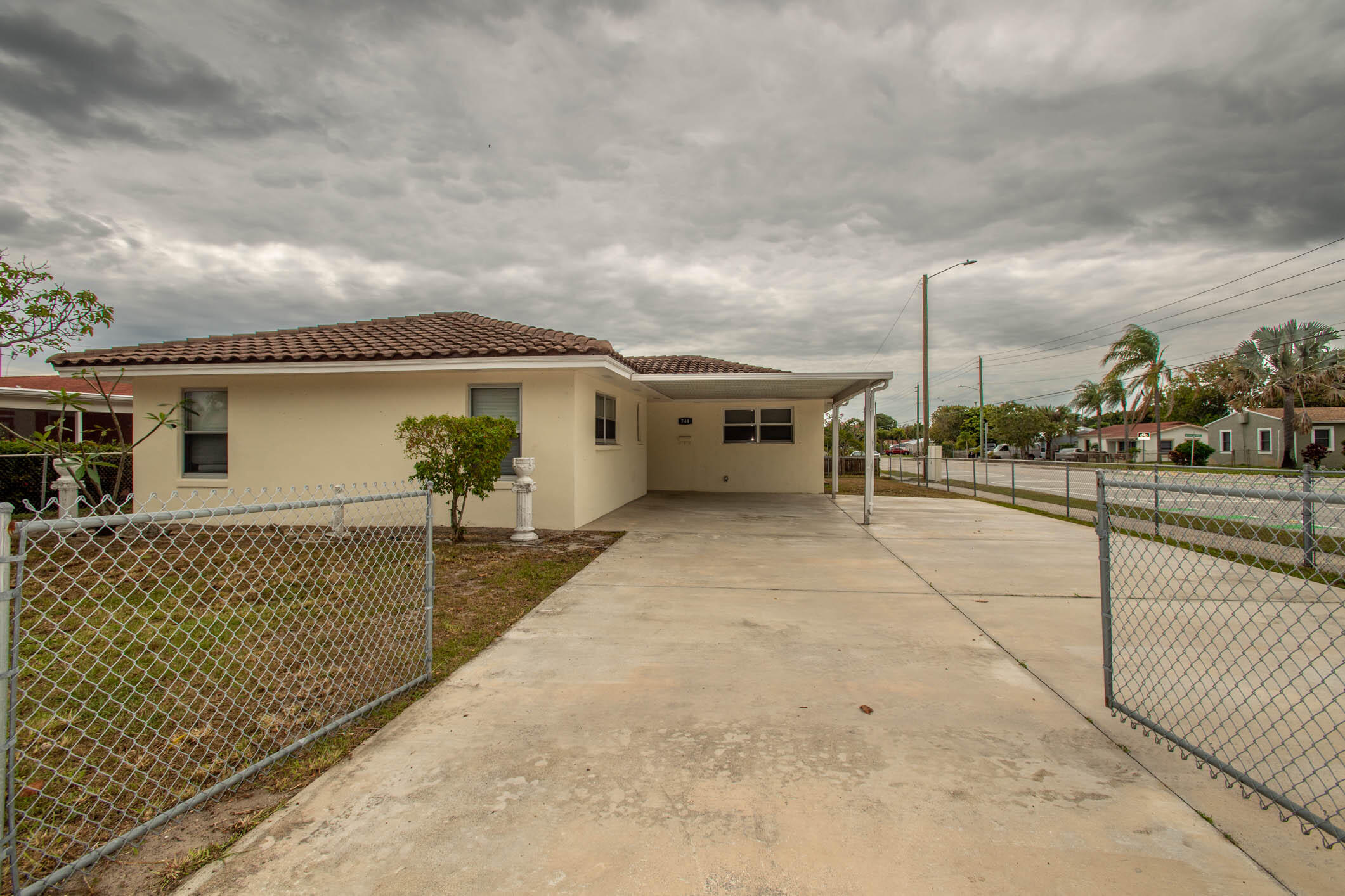 The ideal home is located on a corner lot in the heart of West Palm Beach within the Hillcrest Heights subdivision. This property is located just two miles from the intercoastal, and this desirable spacious floor plan provides a beautifully maintained space that is move-in ready. The newly remodeled bathroom and kitchen make this home ideal for buyers.This home won't last long!